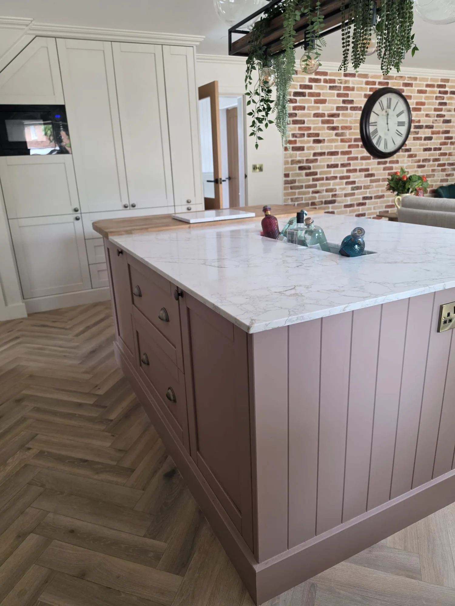 Panelled island with marble worktop